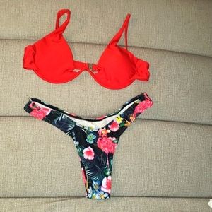 New bikini. Red top. Red Flowers with dark bottom. Size S. New